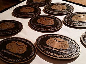 Metropolitan Historical Commission preservation awards program plaques